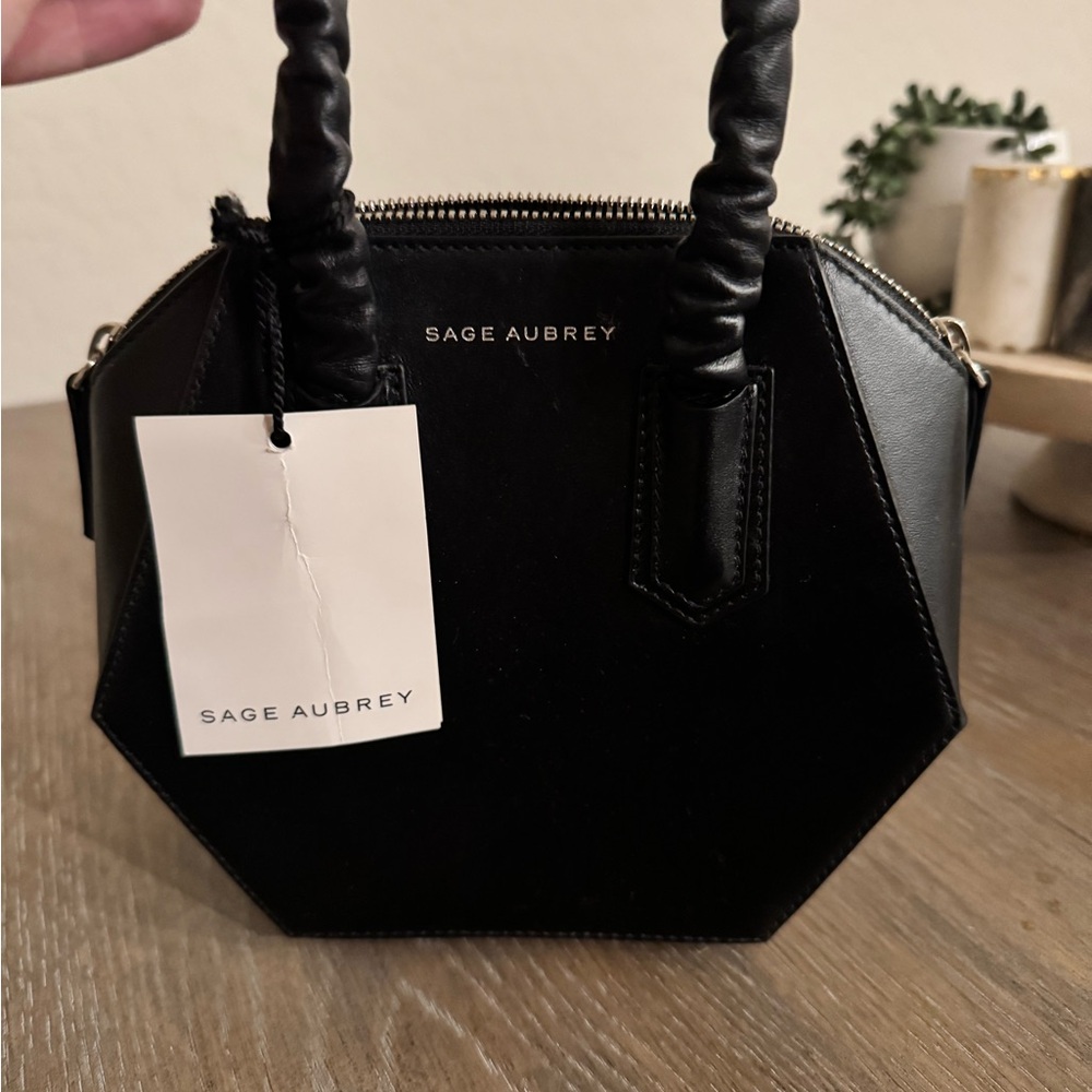 Sleek Black Mini Bag with Gold Hardware